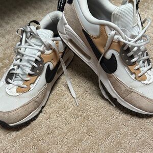 Nike Athletic Shoes in White, Tan, and Black